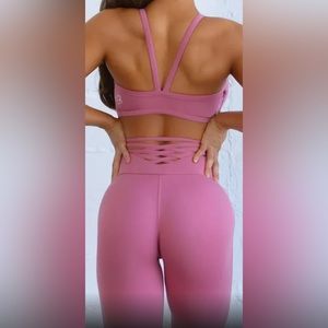 Red Bombshell Sportswear criss-cross back leggings.  Size Small.